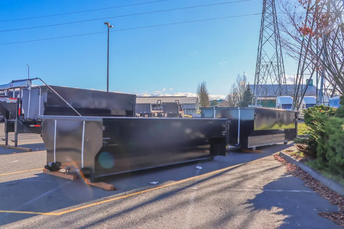 Roll-off dumpster ready for waste disposal at job site for Roofing Dumpster Rental in Greeneville